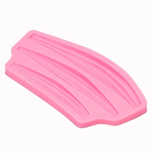 Pink silicone fondant mold featuring three long leaf patterns for cake decoration