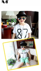 Close-up of kids aviator sunglasses with colorful reflective lenses for summer style