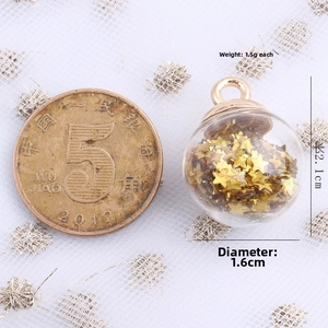 Clear glass ball pendant with gold stars, 1.6cm diameter and 2.1cm length detail view