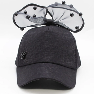 Kids black mesh baseball cap with oversized bow and pearl accents for summer sun protection