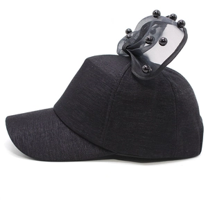 Detailed view of kids' mesh baseball cap with black oversized lace bow and pearls