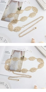 Detailed view of golden leaf hollow metal belt chain for women with elegant design