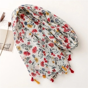 Elegant floral cotton-linen feel scarf with red flower print and colorful fringe tassels