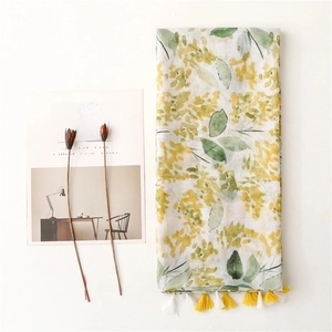 Fresh floral cotton linen scarf with yellow leaf print and fringe tassels in soft white