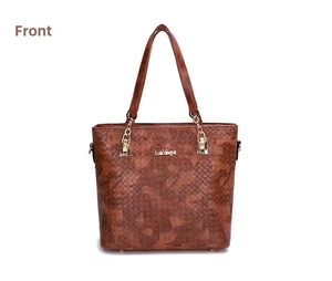 Close-up of brown woven leather texture and gold hardware on this tote bag