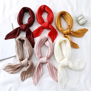 Pleated silk-like scarves in multiple solid colors for versatile summer styling