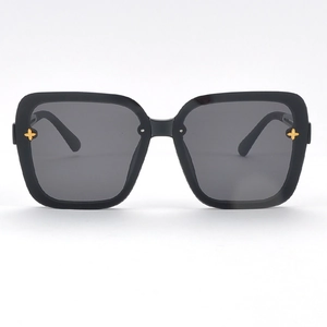 Chic square oversized sunglasses with black frame and golden cross metal accents