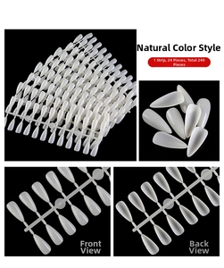 Macro detail of long stiletto natural nail tips featuring a pack of 240 pieces in ABS material