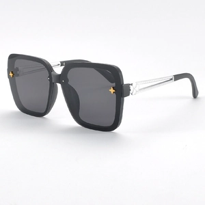 Chic black oversized square sunglasses with gold flower accents and silver hollow temples