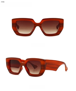 Front and 45-degree side views of modern amber tea oversized square sunglasses