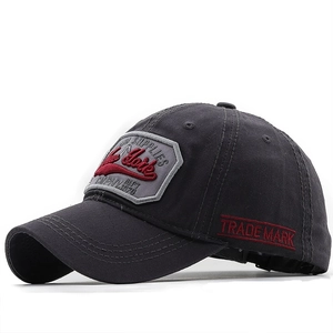 Close-up of vintage charcoal gray cotton baseball cap with 3D New York embroidery detail