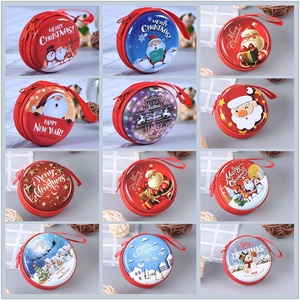 Set of 12 round Christmas tin coin purses with festive Santa and reindeer designs
