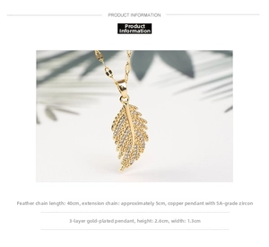 Detail view of 18K gold plated feather pendant with 5A zircons and 45cm chain size info
