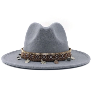 Close-up of gray wool fedora featuring an ethnic woven band with metallic coin charms