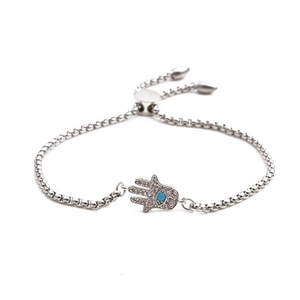 Bracelet ajustable main de Hamsa en argent avec détail d'oeil maléfique en zircon
