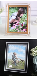 Detail view of crystal glass picture frames with elegant gold and silver metallic borders