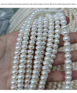 Detail showing smooth surface and high luster of natural white freshwater pearls for DIY