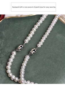 Detailed view of genuine freshwater pearl necklace with creative peanut shaped clasp