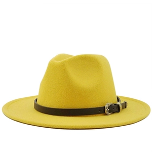 Classic bright yellow wool fedora hat with brown leather band and golden metal buckle