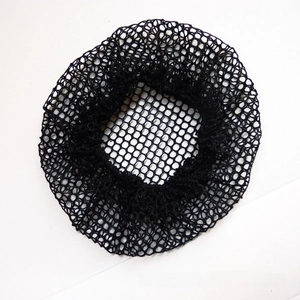 Detail of black elastic hairnet net pocket for professional bun styling and ballet hair