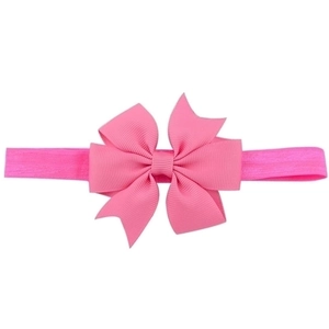 Pink ribbon bow baby headband featuring grosgrain texture and high elastic band