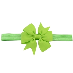 Neon green baby headband with a large ribbon fish-tail bow for infants and toddlers