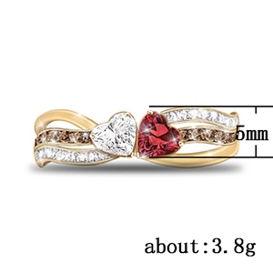 Dual heart fashion ring with red and white crystals in a gold plated setting