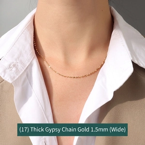 1.5mm thick star link necklace in 18K gold plated titanium steel worn on model