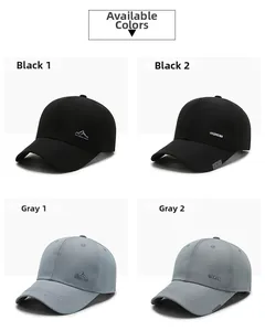 Detail view of cotton baseball caps with mountain logo and sport embroidery in black and grey