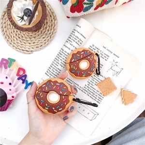 Detail of donut silicone AirPods case with colorful sprinkles and metal carabiner hook