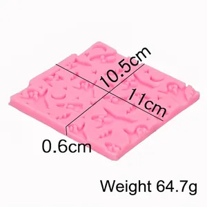 Pink silicone Halloween mold with moon and stars patterns for fondant and DIY crafts