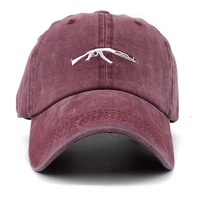 Vintage washed cotton baseball cap in burgundy with white AK-47 rifle embroidery