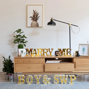 Golden LED letter lights MARRY ME and BOY & SWP for romantic indoor decor