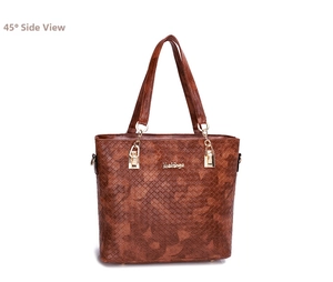 Detail of brown tote bag featuring embossed woven texture and gold metal hardware