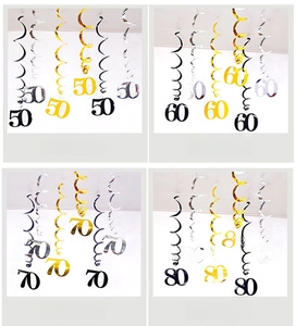 Detail of multi-color PVC spiral hanging swirls for 50th to 80th birthday party decorations
