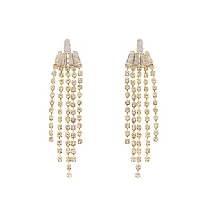 Detail of long gold tassel earrings with fan-shaped rhinestones and dangling crystals