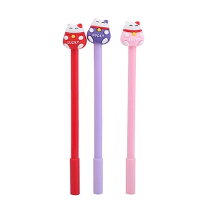 Three cute cartoon cat gel pens in red, purple, and pink with lucky mascot toppers
