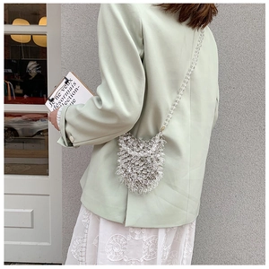 Exquisite beaded crossbody bag with transparent acrylic crystal fringe design for parties