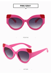 Rosa Cat-Eye Sonnenbrille mit roten Details und Verlaufsgläsern in zwei Ansichten