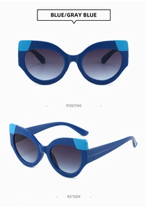 Cat-Eye-Sonnenbrille mit blauem Rahmen und Verlaufsgläsern in Front- und Seitenansicht