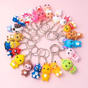 Variety pack of colorful PVC cartoon character keychains with silver metal rings and hooks