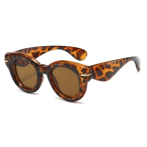 Fashionable oversized leopard print round sunglasses with stylish gold metal accents