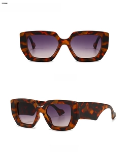 Detail view of square leopard print sunglasses with gradient grey lenses from two angles