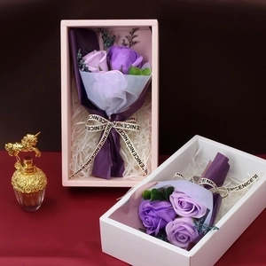 Elegant purple soap flower gift boxes with roses and ribbons in pink and white packaging