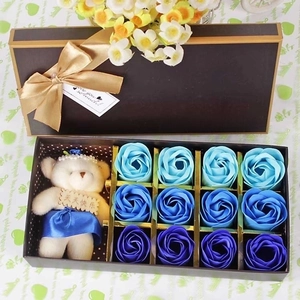 Detail of blue soap rose gift set with a cute plush bear and Sweet Love greeting box
