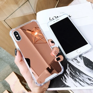 Detail showing rose gold mirror iPhone case with protective air cushion edges and hand grip