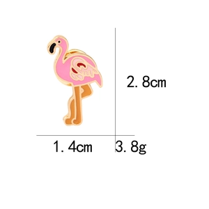 Detailed view of flamingo enamel pin showing 2.8cm height and 1.4cm width dimensions