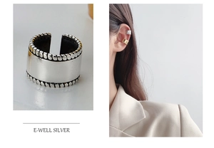Detailed macro view and model showcase of vintage twisted edge ear cuffs in silver and gold