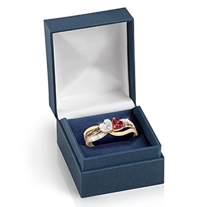 Elegant gold double heart ring with red and clear crystals in a blue jewelry gift box