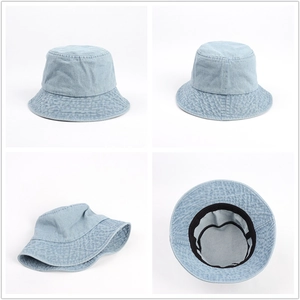 Detail view of light blue denim bucket hat showing fabric texture and inner sweatband